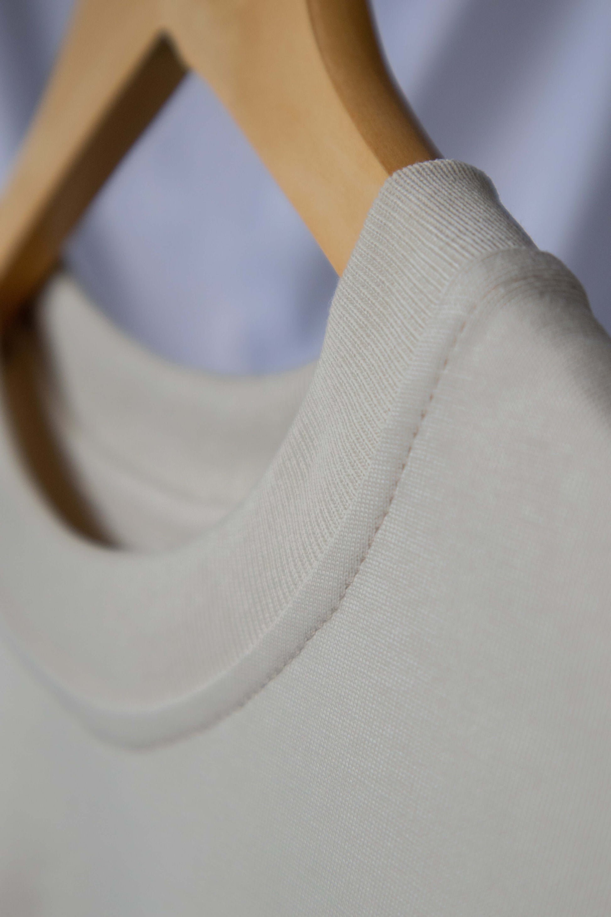 Close up on details for blank front bone coloured ThreeFive T-shirt